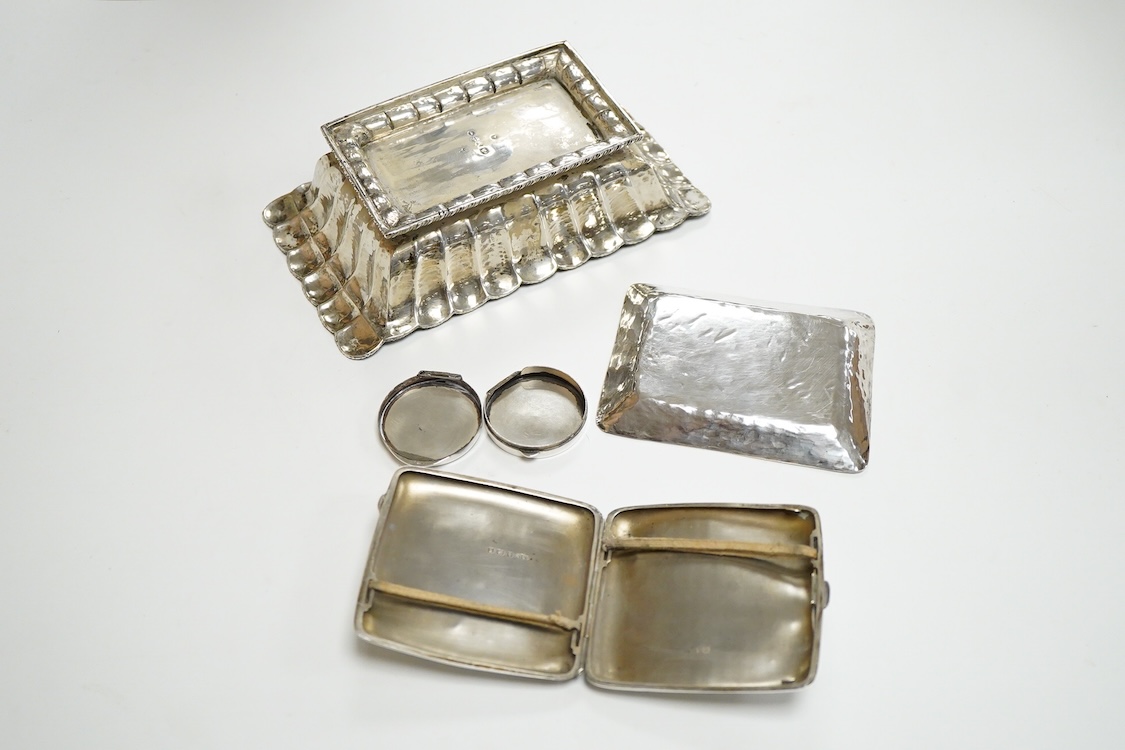 A continental 800 standard oblong shaped dish, of fluted design, together with a Peruvian sterling dish and similar pill box and a George V silver cigarette case, 16.6oz.